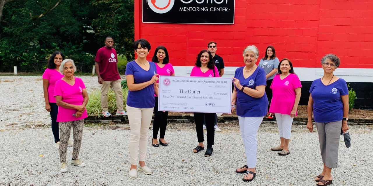Asian Indian Women’s Organization presents $41,400 to The Outlet
