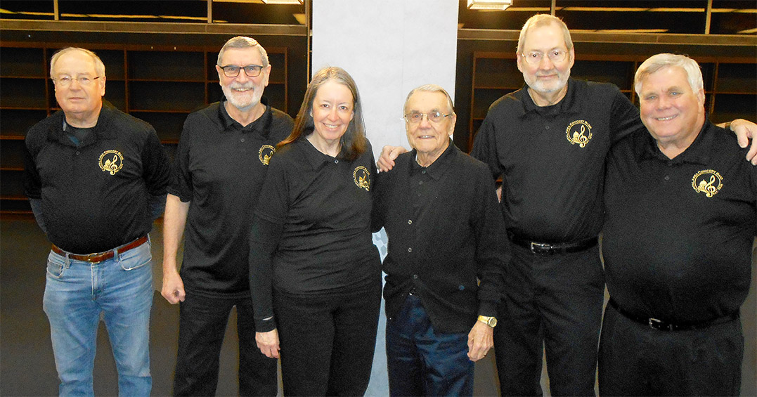 Six longstanding members of the group are: (left to right: Pat Dennis, Richard Zepp, Jan Lyons Zepp, Ralph Ashcraft, Tom King, and Rollo Saucier). Photo Credit: Harry Hild